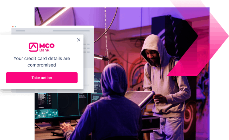 Two people in hoodies work at computers in a dark room; a pop-up alert warns, "Your credit card details are compromised" from MCO Bank, highlighting the dangers of credit card scams.